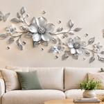 3D floral acrylic mirror wall decal installed above a living room sofa